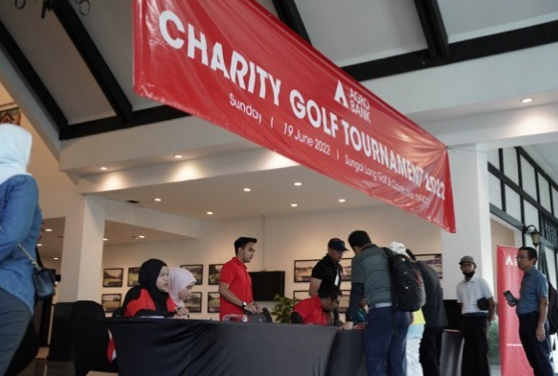 AGROBANK Golf Tournament 2022 — golfers at branded backdrop with Agrobank teardrop banners at Sungai Long